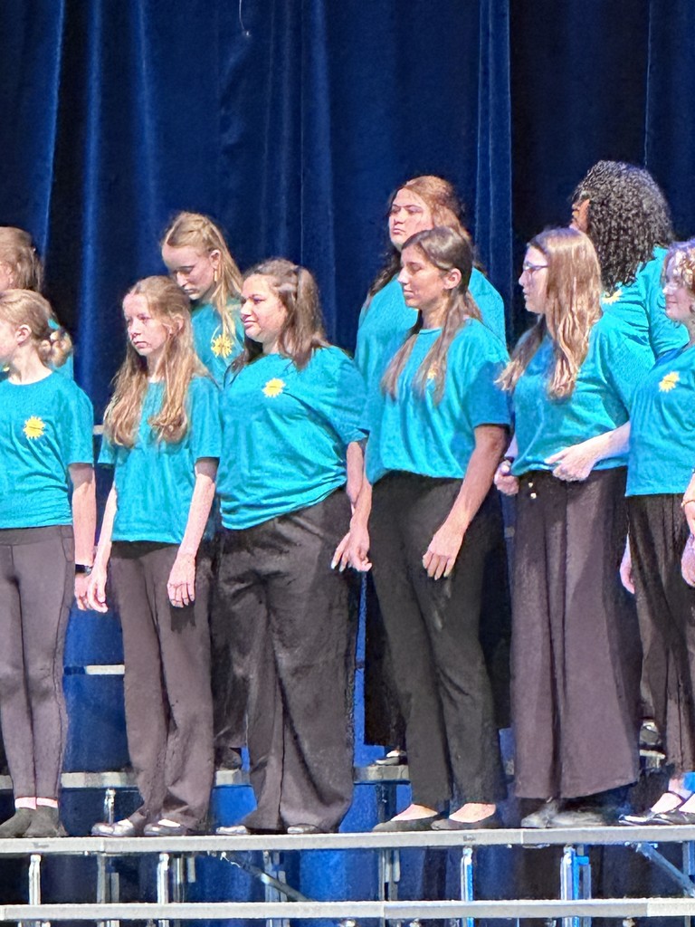 students singing on risers