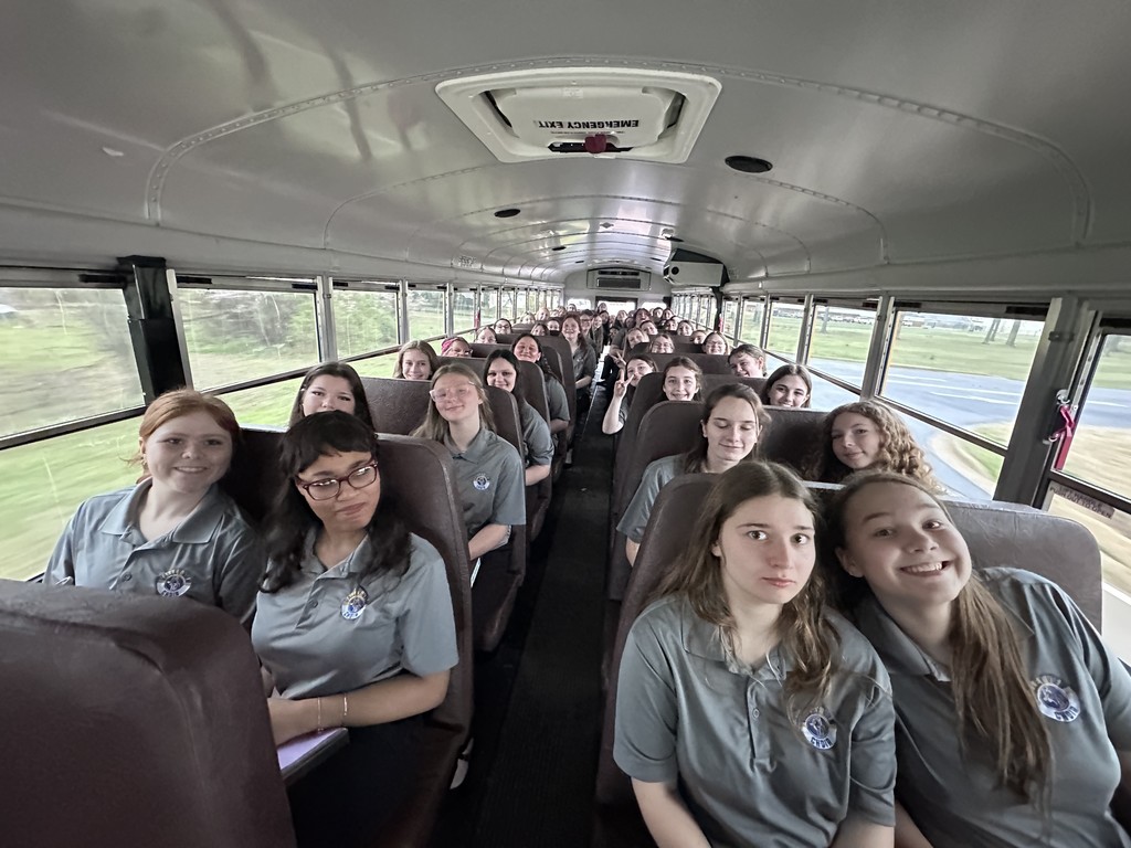 choir students on a school bus
