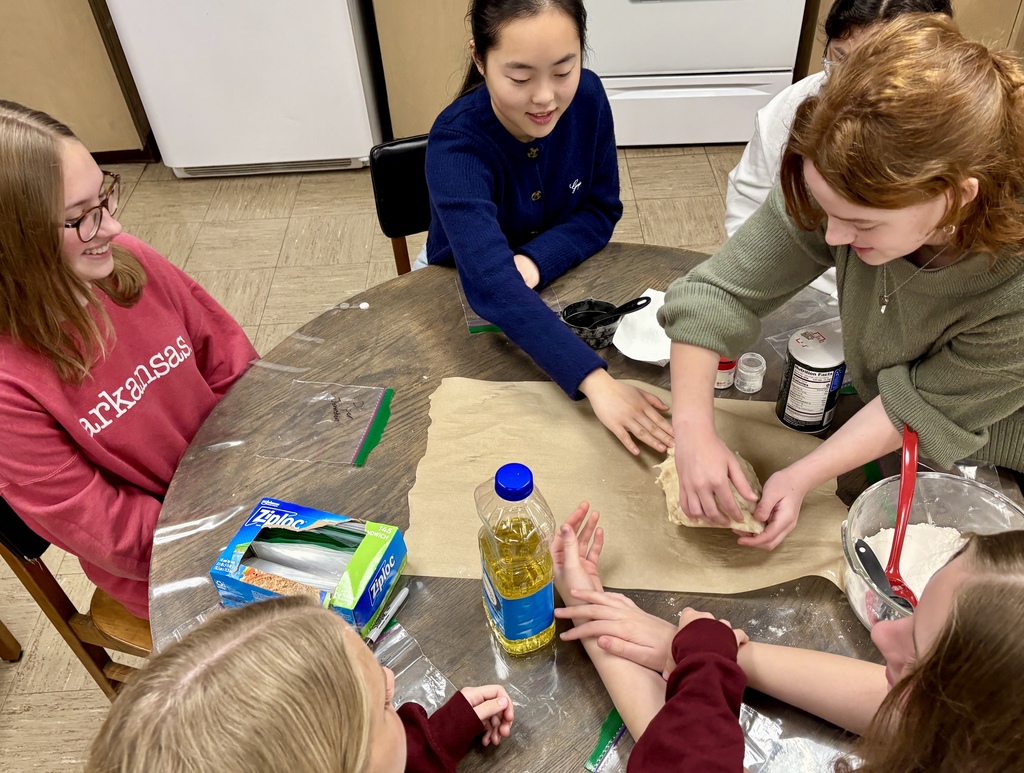 students shaping Play-Doh into food