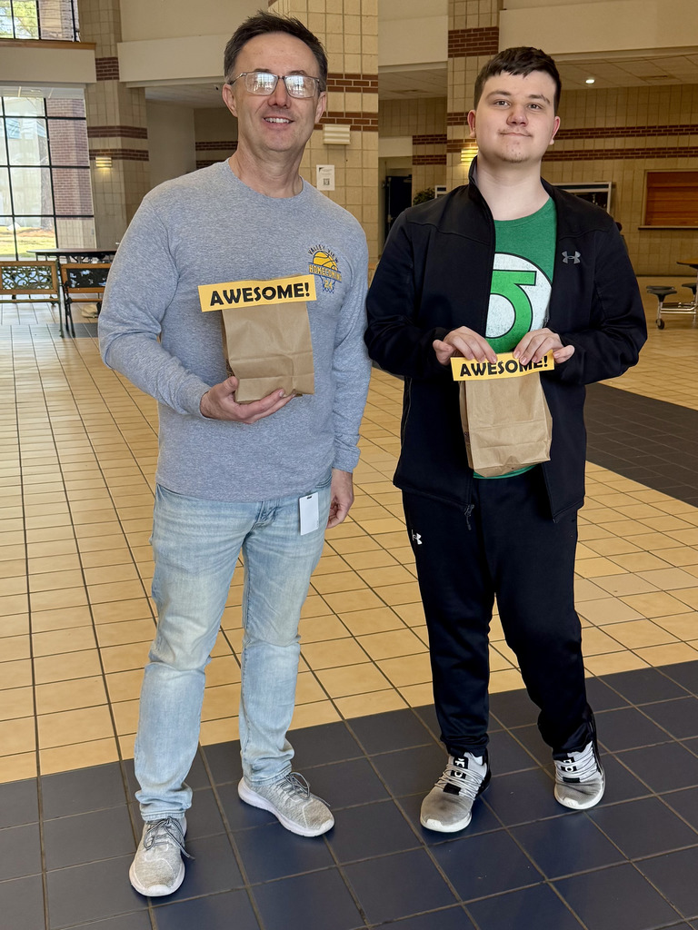 Blazer of Week teacher and student with bag of treats