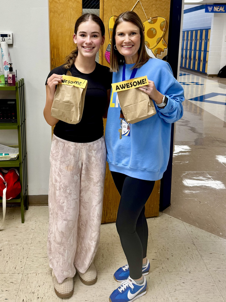 Blazer of Week teacher and student with bag of treats