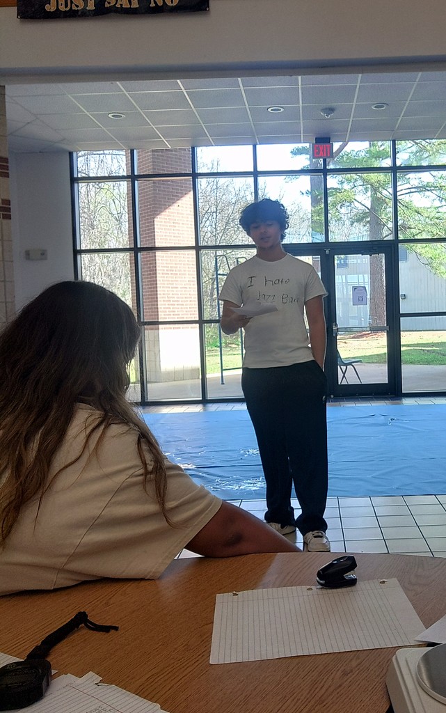 students going over findings of egg-drop activity