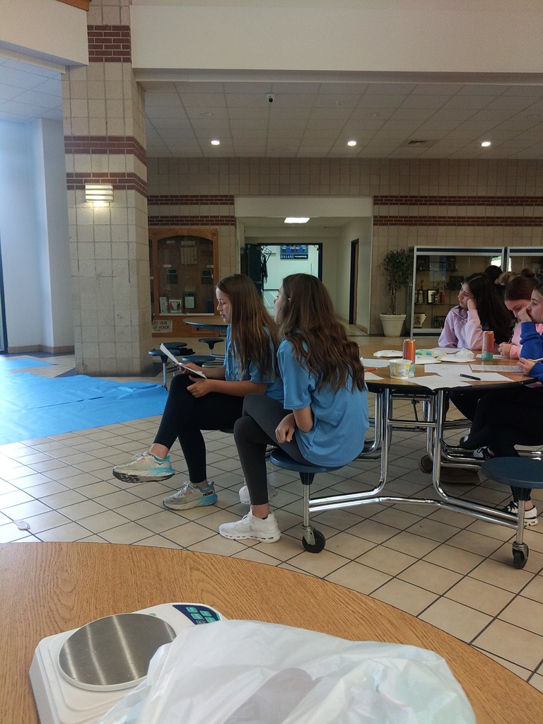 students watching egg-drop activity
