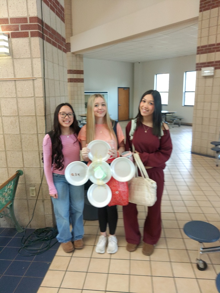 students with their created egg-drop device