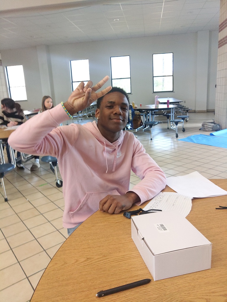 student about to do egg drop activity