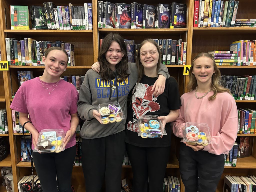 March Reading Challenge winners - four girls standing together