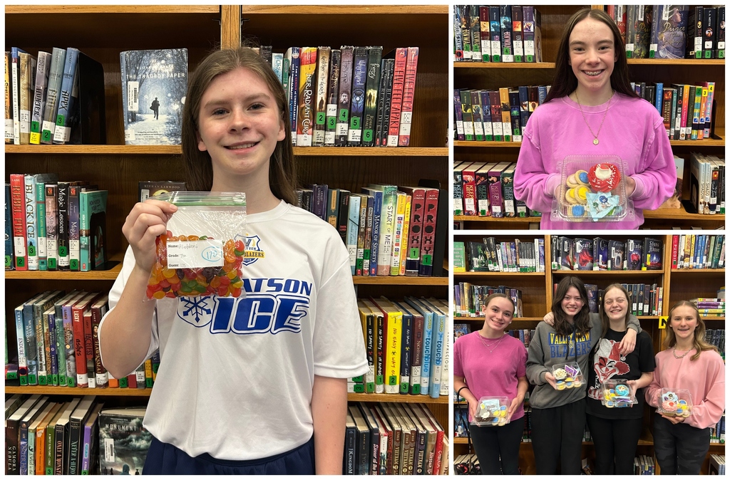 reading challenge winners holding treats