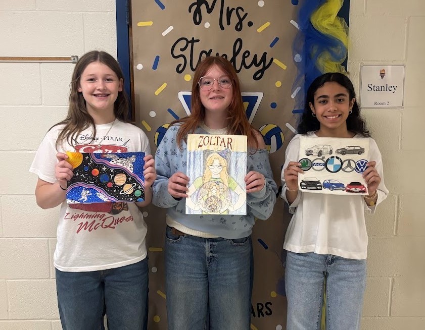 three girls holding winning circle projects
