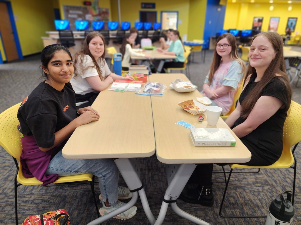 students having lunch and playing games
