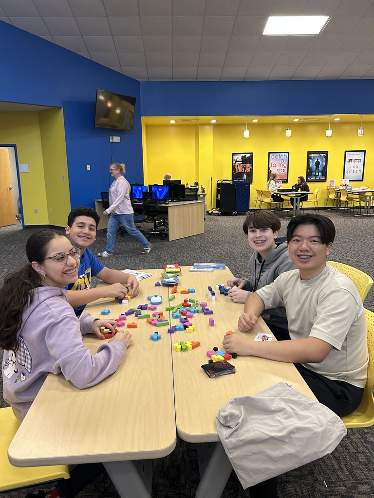 students playing games at a table