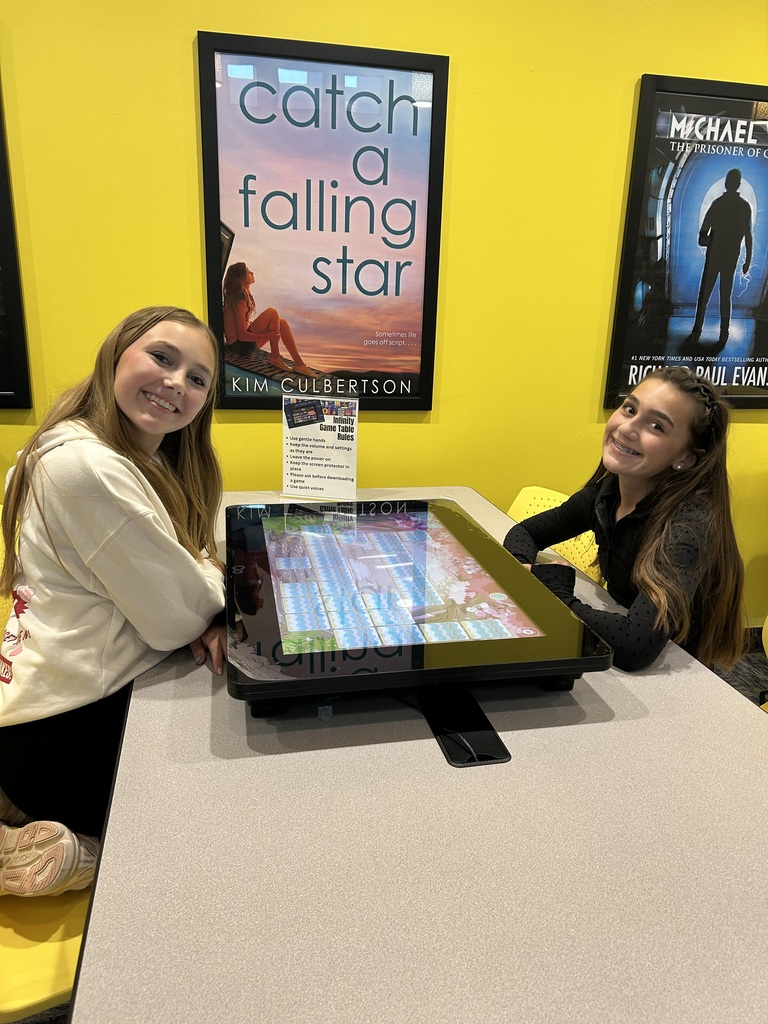 two girls playing a game together