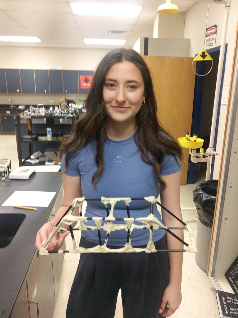 girl holding her bridge