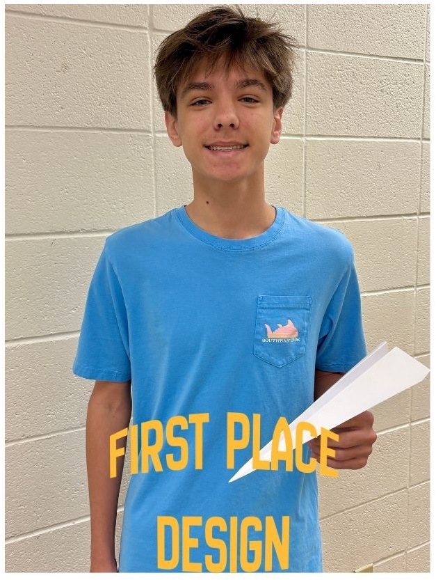 winning student holding plane