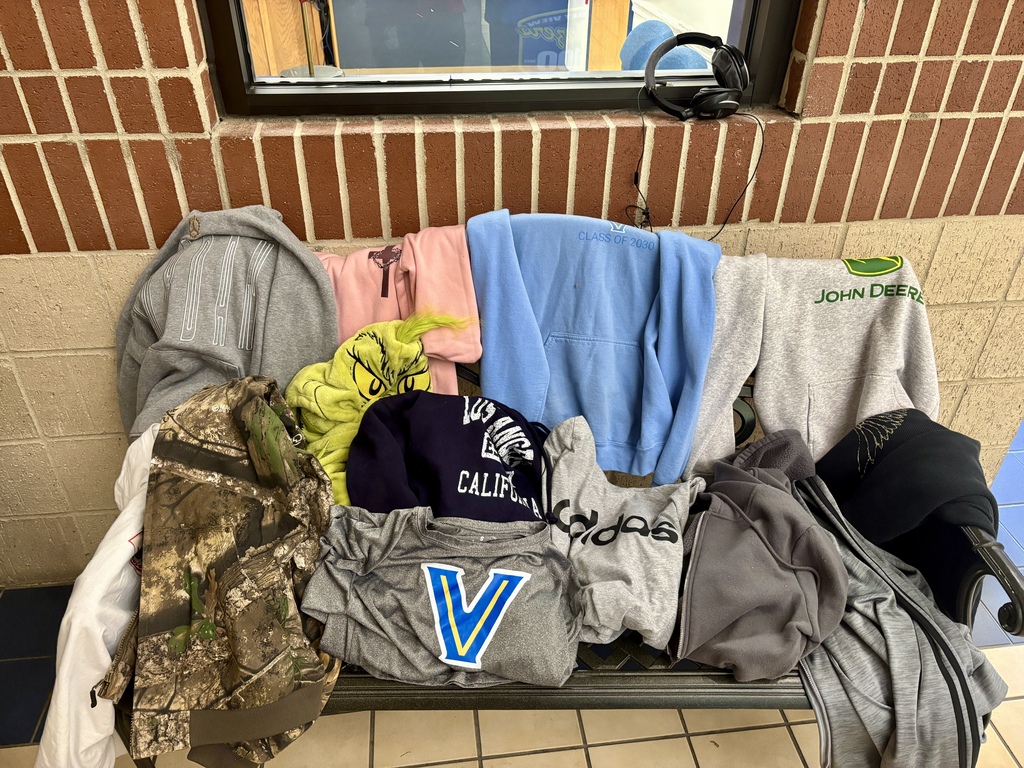bench covered in lost clothing