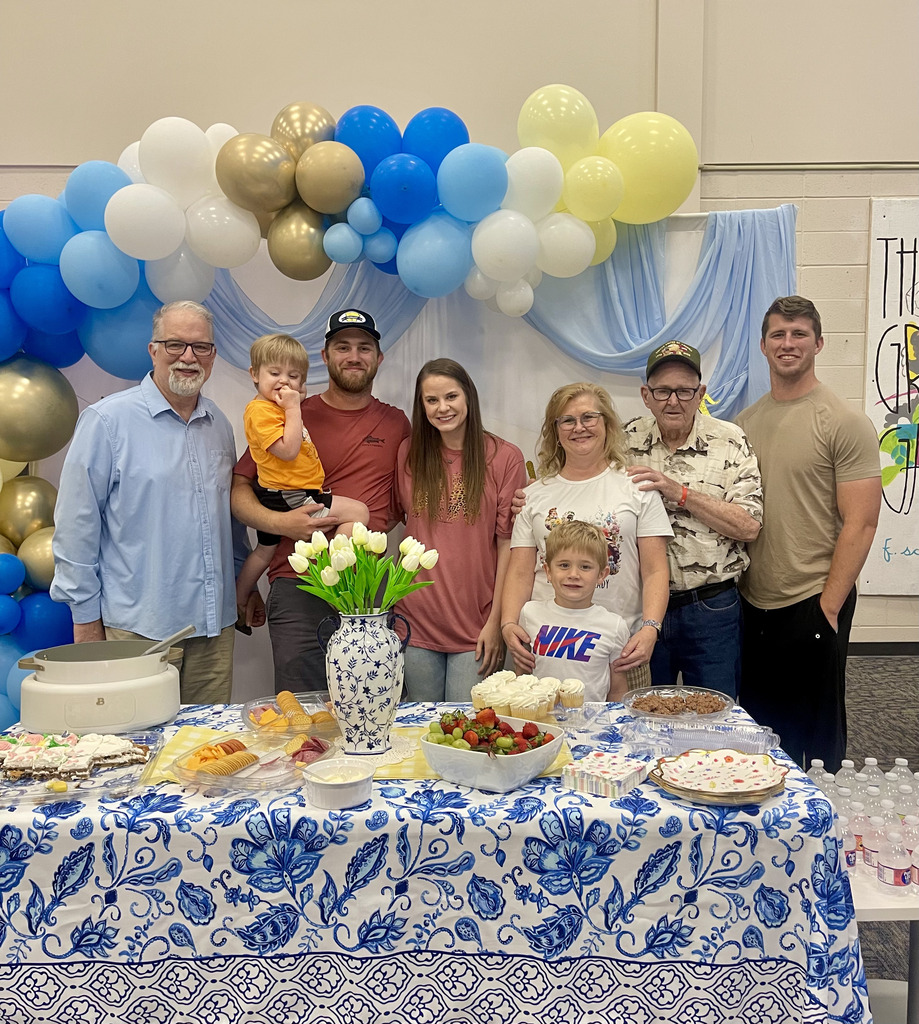 Stacy with family at retirement reception 