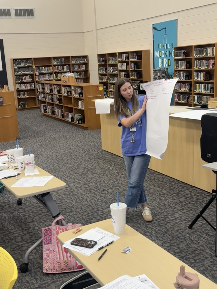 Staff working on Code of Ethics.