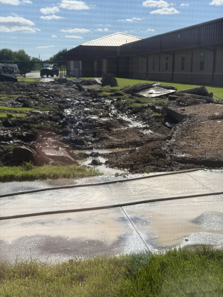 Removing the courtyard sidewalk.