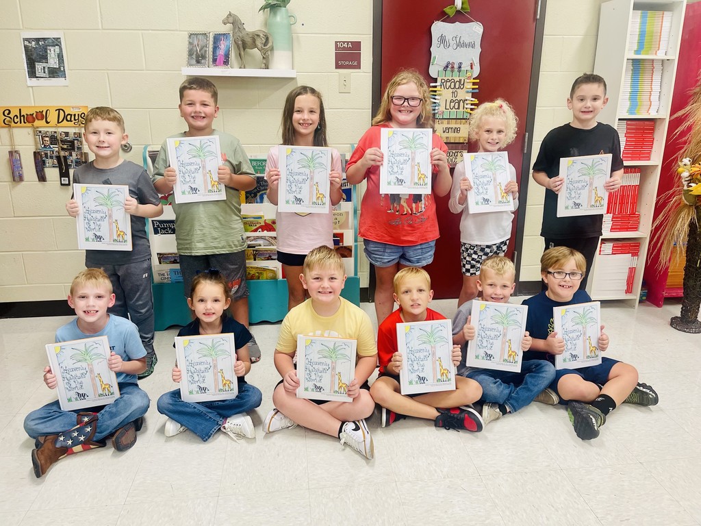 Ms. Shawna's 2024-25 1st Grade Class with Book