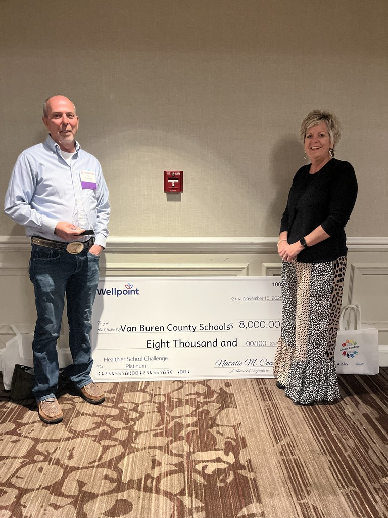 Tim & Teena Hodges with Check