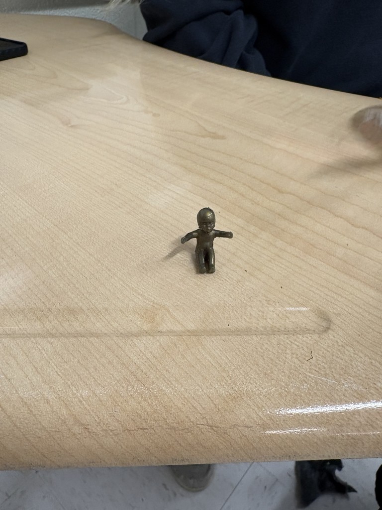 baby jesus on a student desk found in King CAke