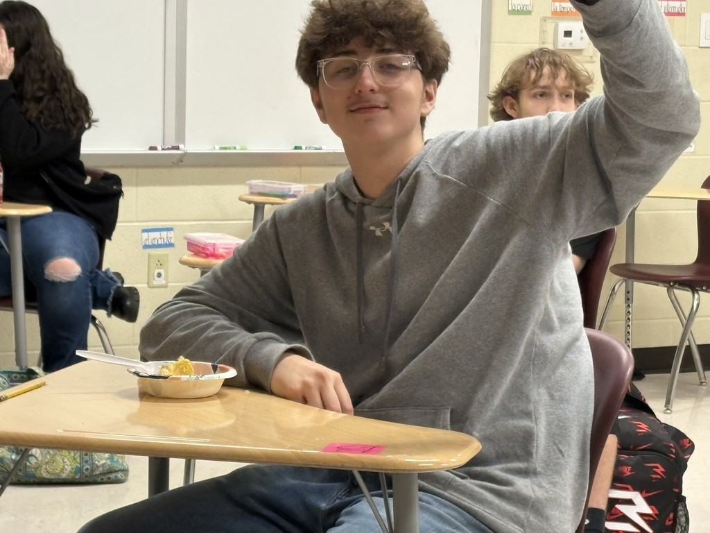 students eating king cake in Spanish II