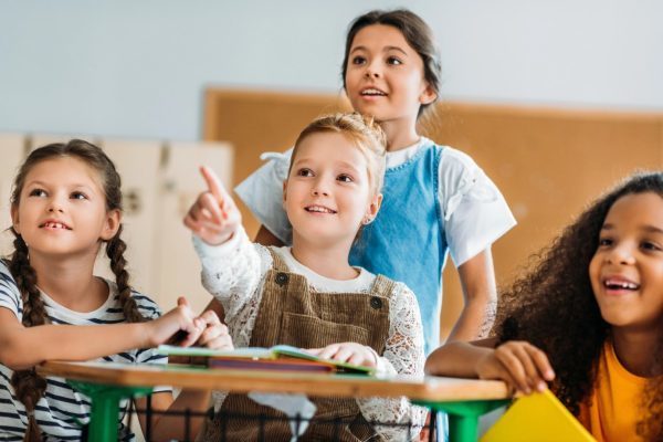 female students happy in a classroom