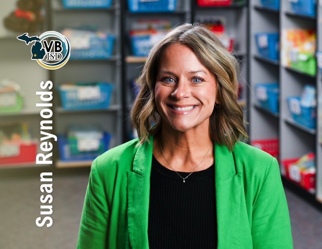 Photo of Susan Reynolds wearing a green blazer looking and smiling at the camera with her name and the VBISD logo transparently overlaid.