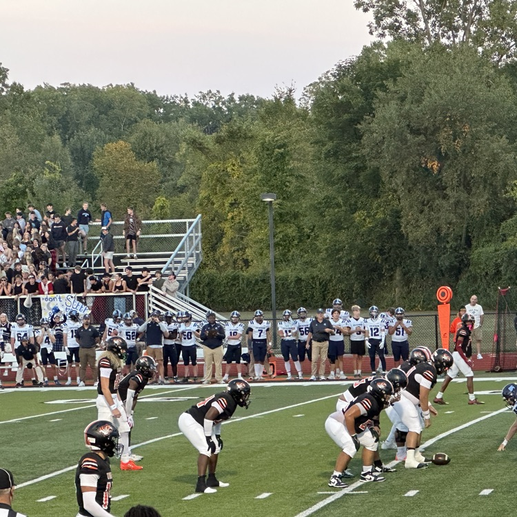 Football players at the line of scrimmage