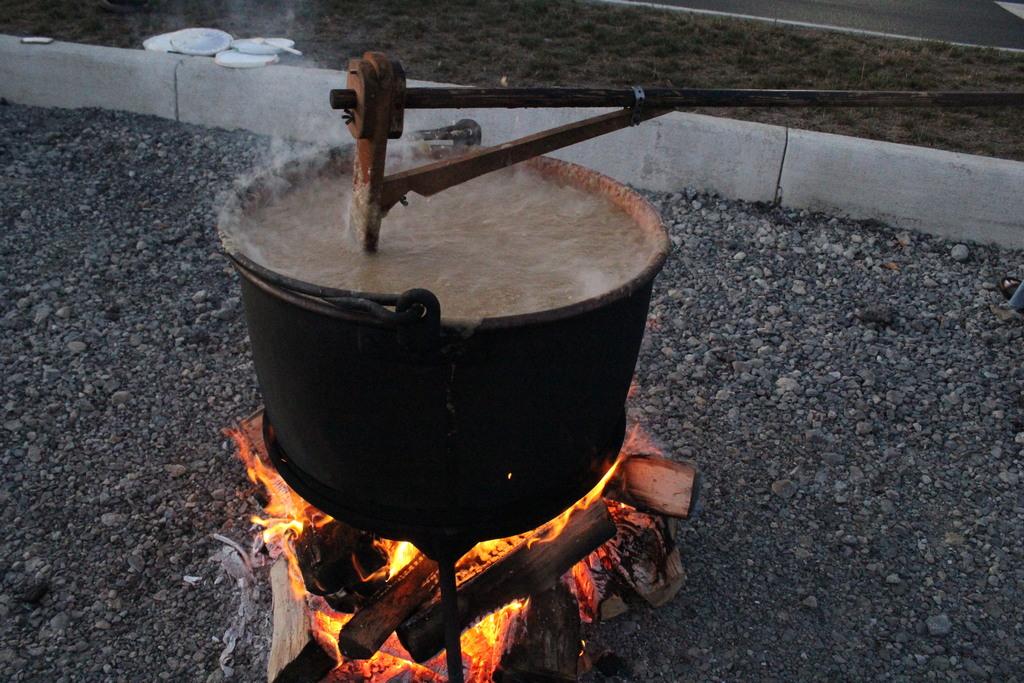 Boiling the apples down to end up with apple butter