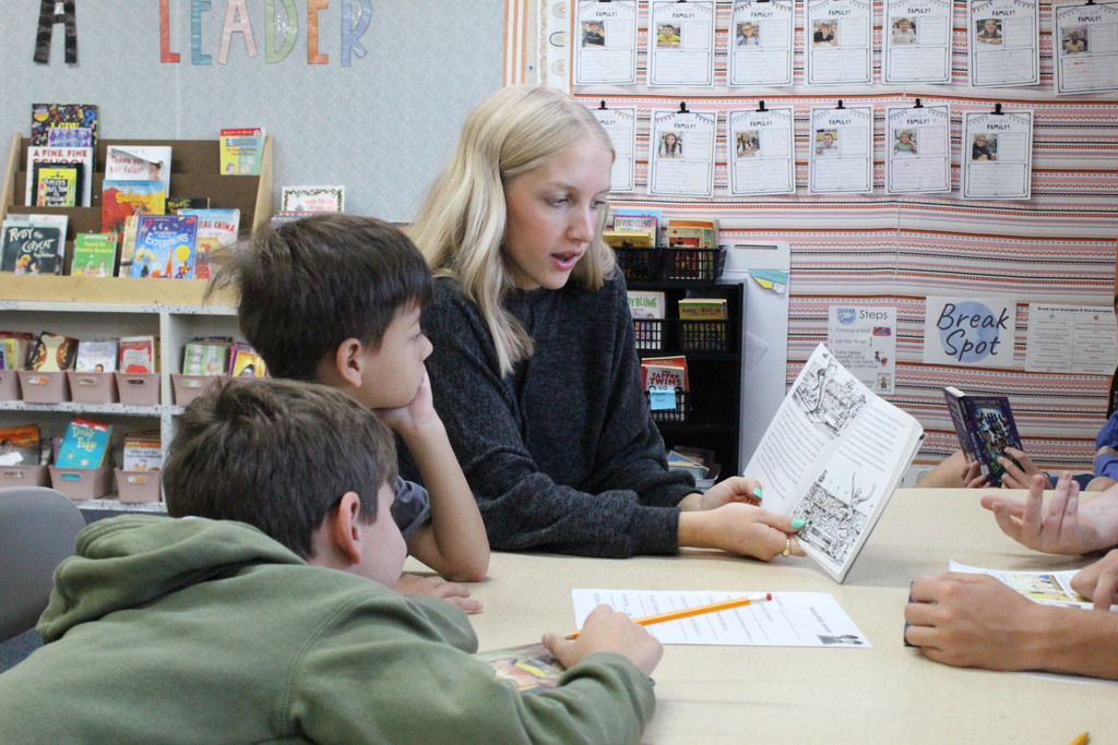 Students from the elementary and high school came together for Buddy Reads today.