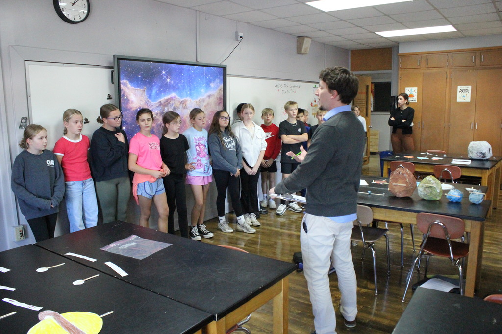 Mr. Stanford explains how the gallery walk will work.