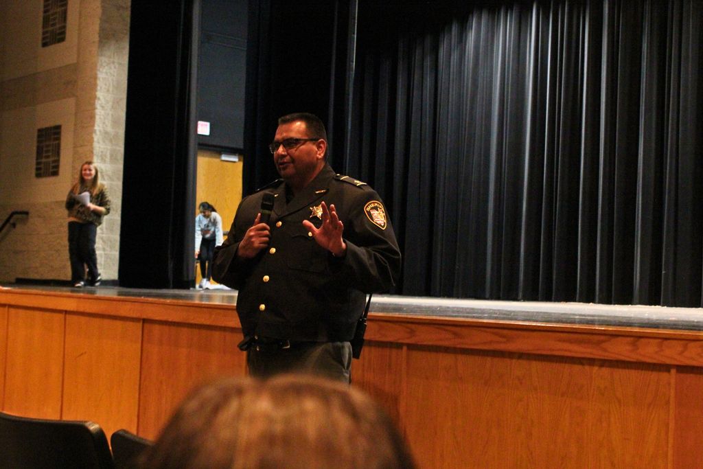 Hancock County Sheriff Michael Cortez praises students for the work they have done this week to promote school bus safety.