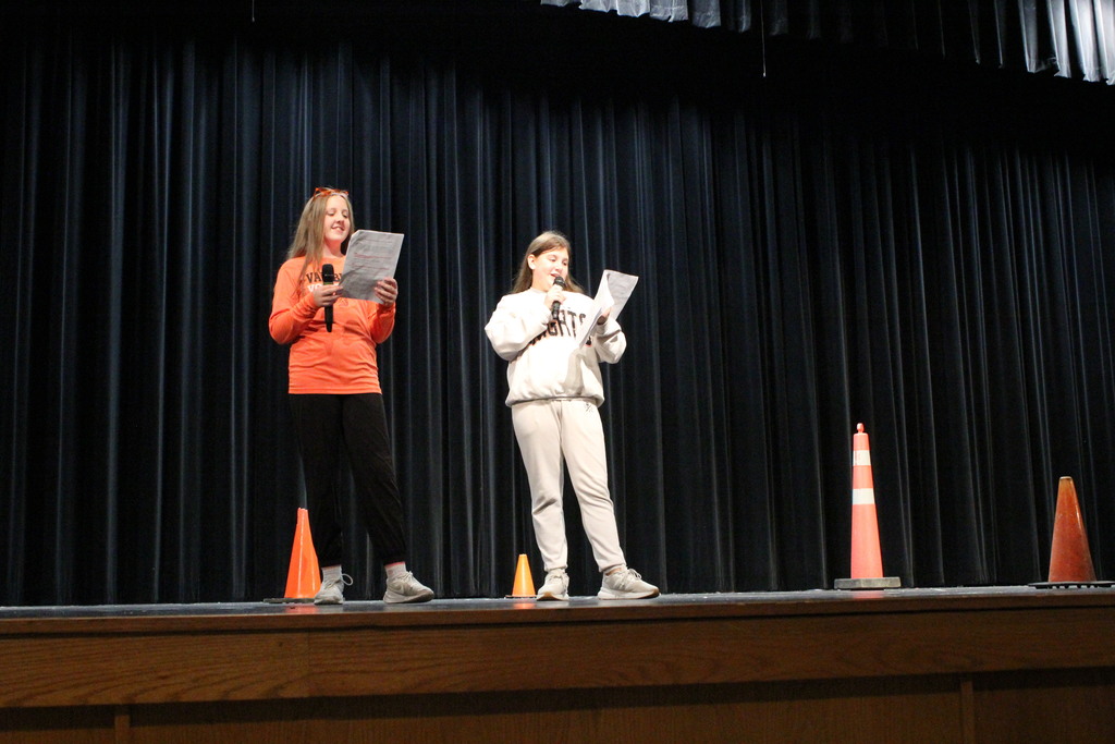 LEADS students introduce the next pep rally competition.