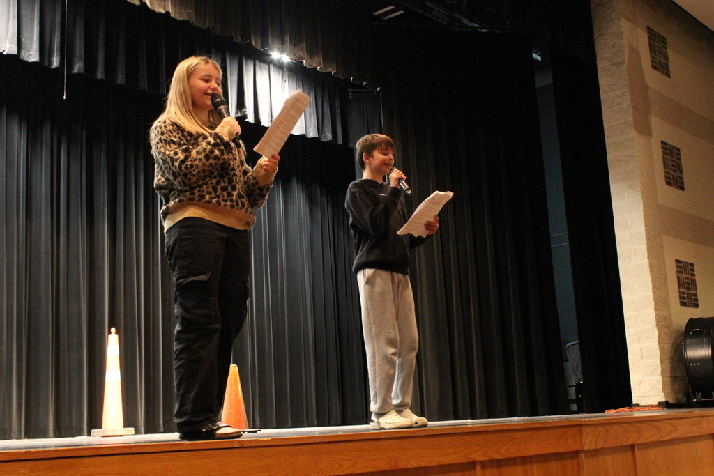 The emcees for the event start the pep rally.