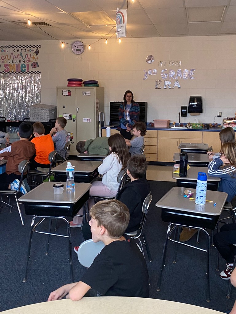 Mrs. Rowland speaks to the students.