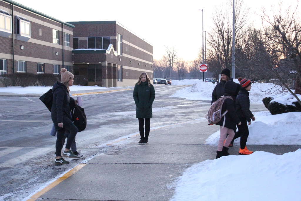 The ESC aides also contribute to the group effort to make sure all students make it to school safely.