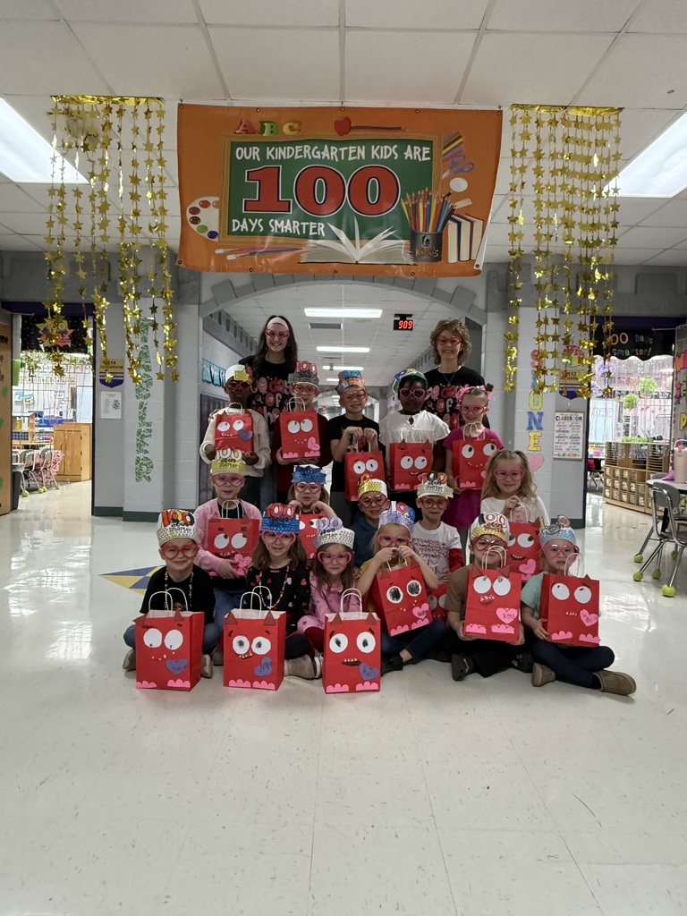 A class models their 100th Day headbands.