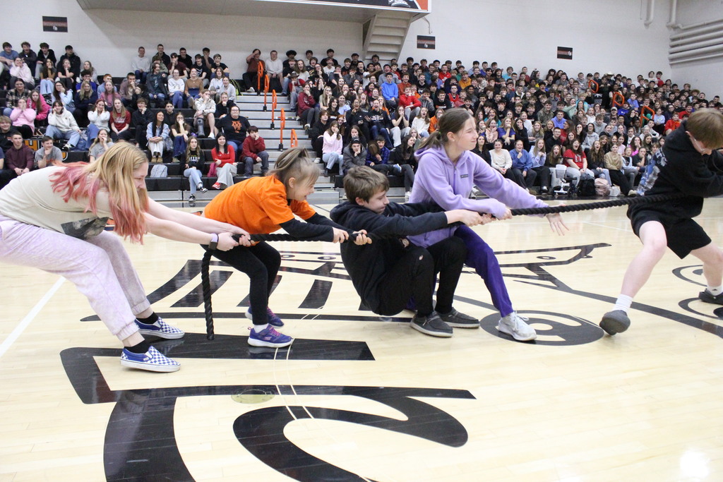 Students give everything they have in the tug-of-war.