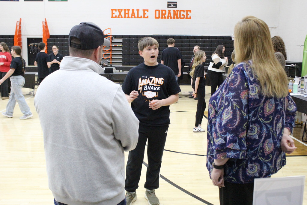 A student shares with the judges.