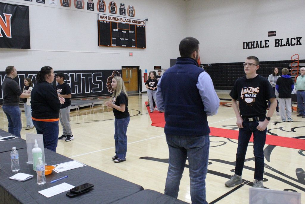 Students speak to the judges.