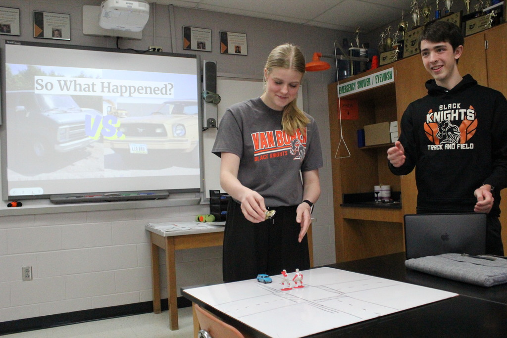 Ava and Andrew demonstrate what happened in the "accident" to prove who was at fault.