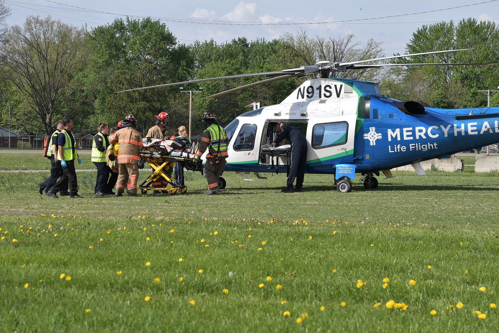 One of the actors in the mock crash is loaded into Mercy Health Life Flight.