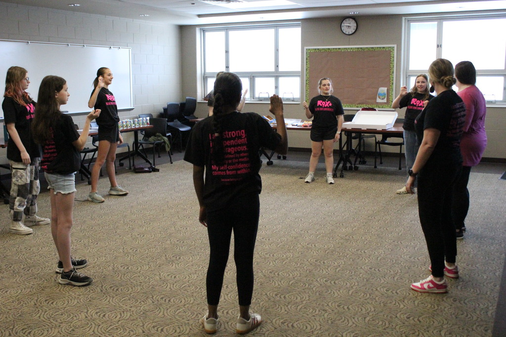 Students participate in the ROX meeting.