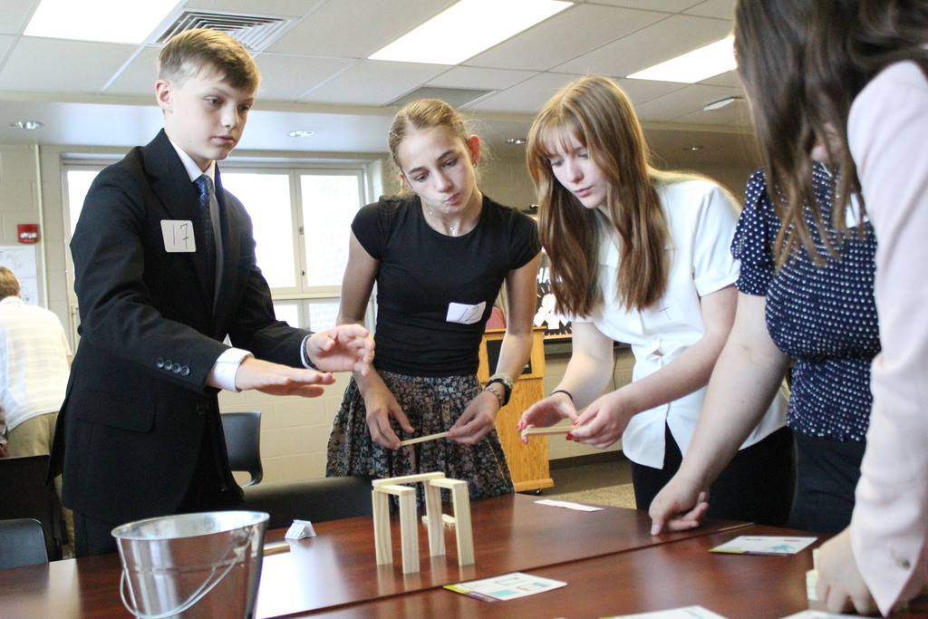 Students try a new approach during the Action-Based Teamwork Challenge.