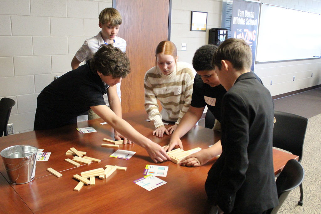 Students work together to complete the challenge.
