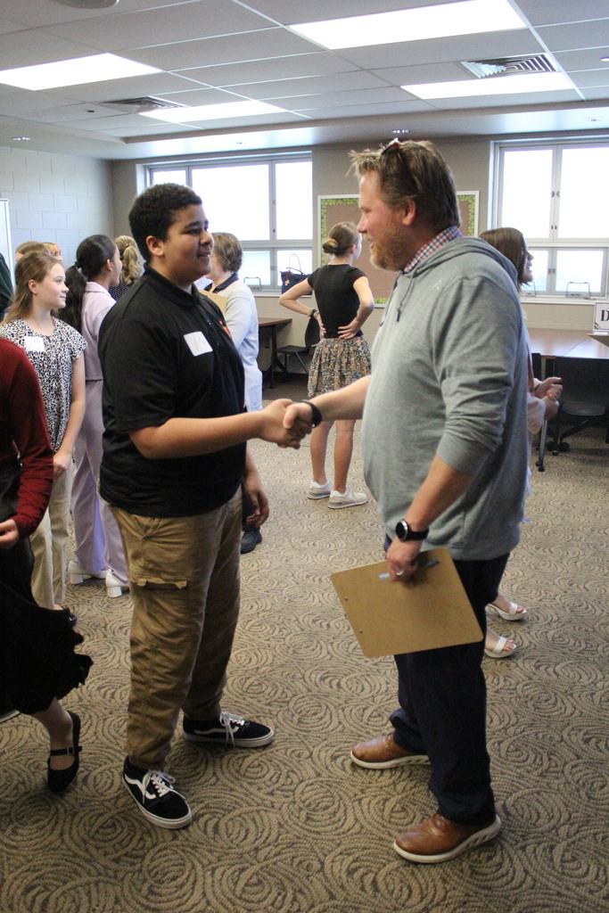 A student participates in the Work the Room Challenge.