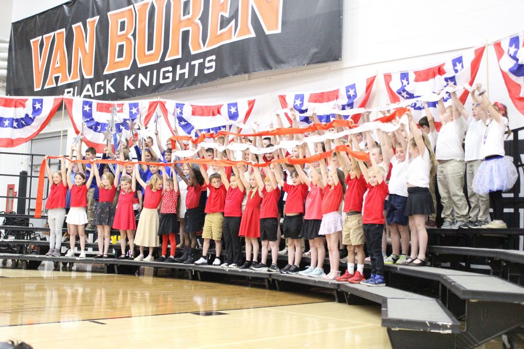 Students create the American flag during "Stars and Stripes Forever."