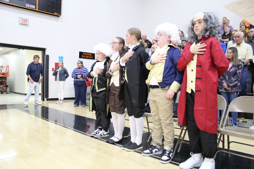 The Founding Fathers stand for "The Star-Spangled Banner."