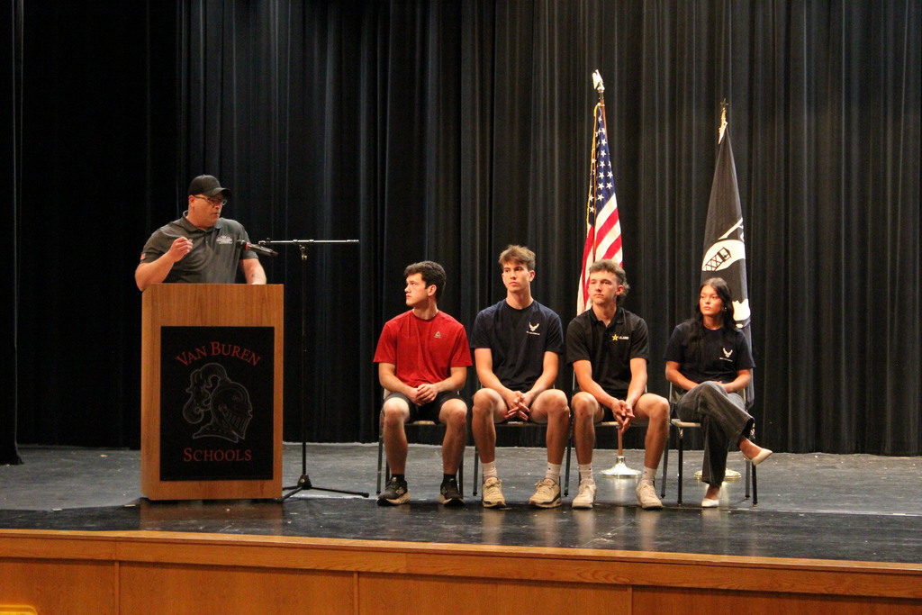 Mr. Andy Sterling speaks to the signees about the significance of their decision to join the military.