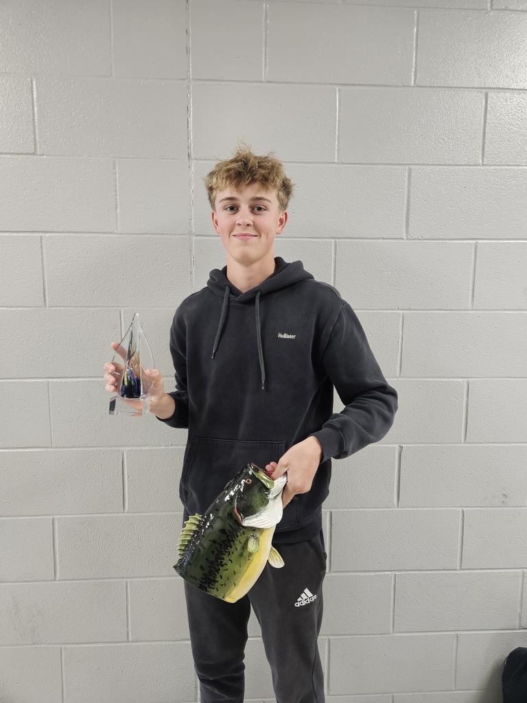 Rockstar Award-winner Travis Carey (also earned Best of 3D for the 3D bass he is holding and Best of Mixed Media).